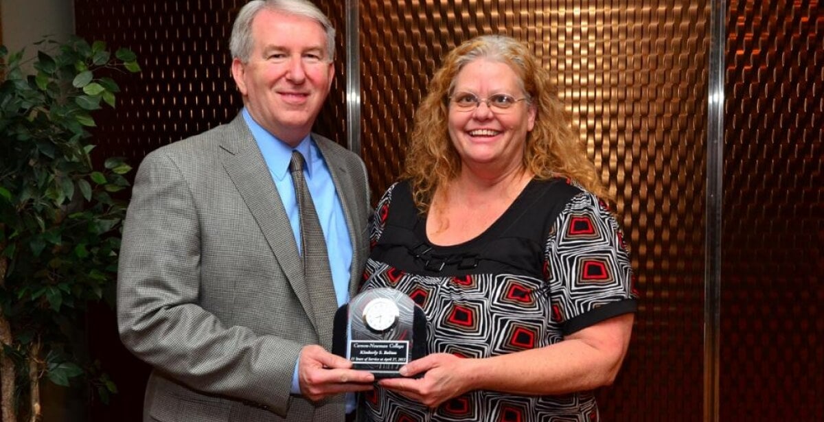 Dr. Kimberly Bolton receiving an award