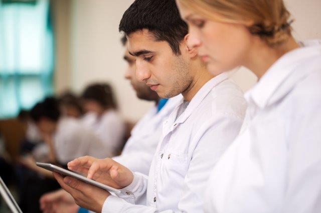 nursing students using tablets