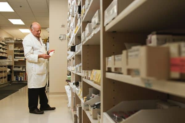 Male doctor in hospital store room